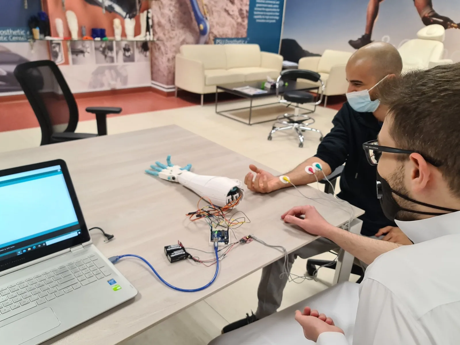 A student-built robotic arm controlled by muscle signals